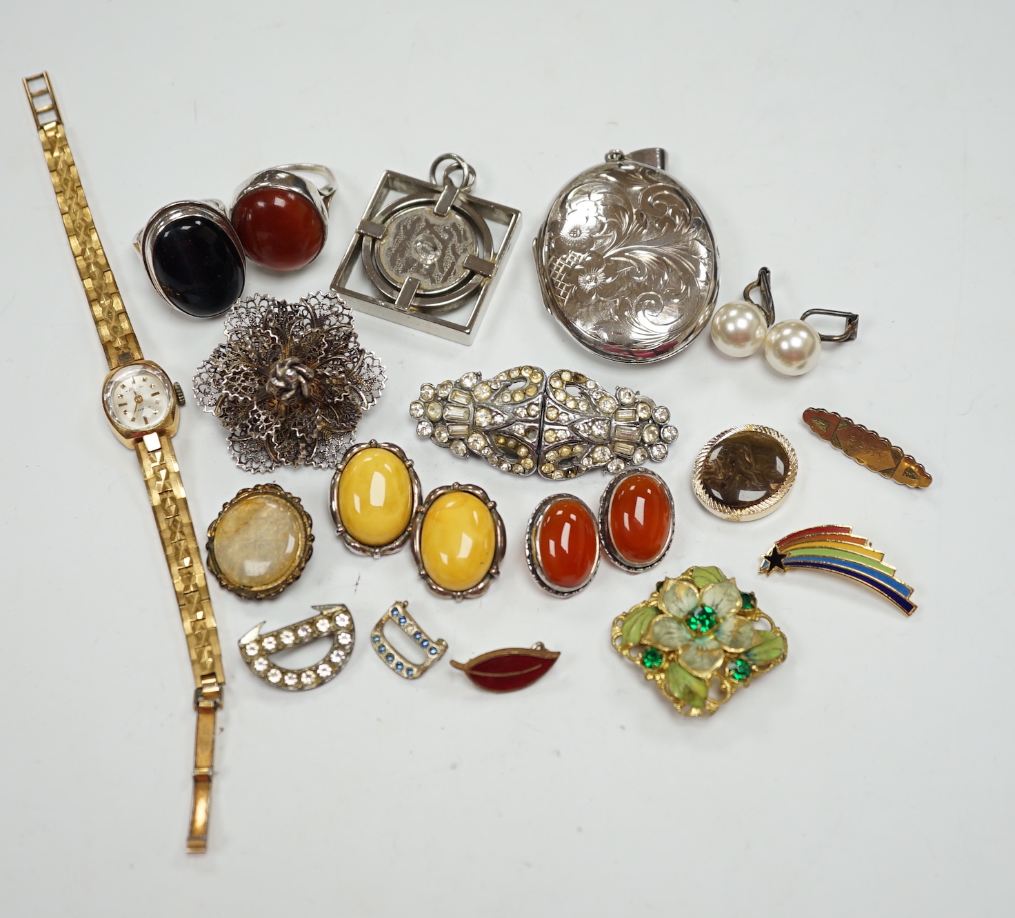 A silver and cabochon set dress ring, mixed costume jewellery and a lady's wrist watch.
